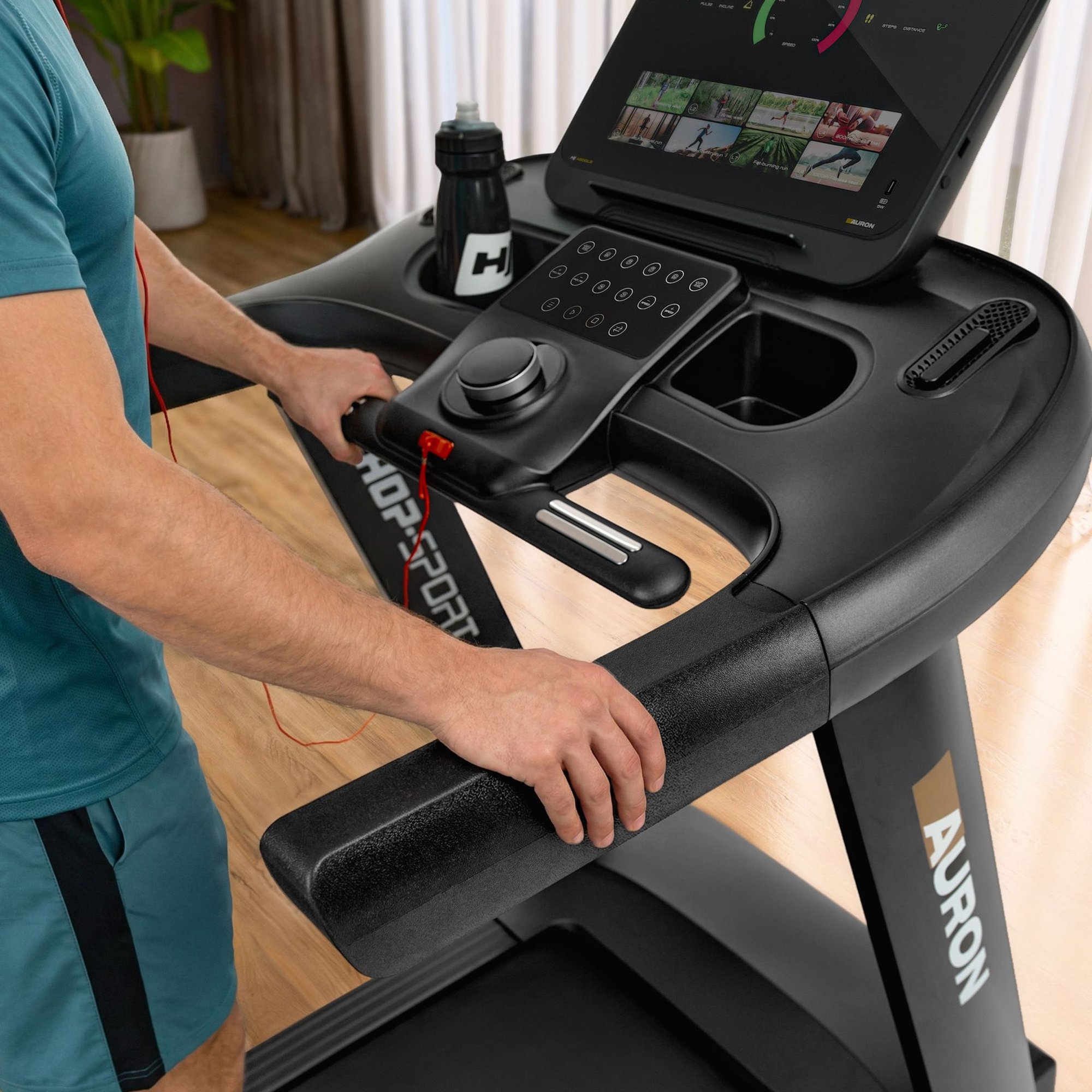 Écran avec port USB-C, capteurs de pouls et clé de sécurité magnétique.