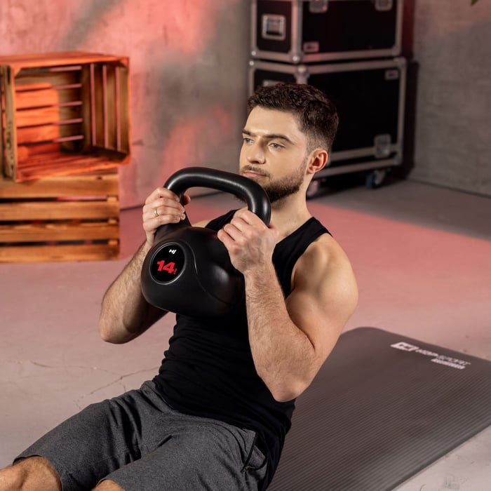 Kettlebell poids de musculation ergonomique pour exercices de cross training.