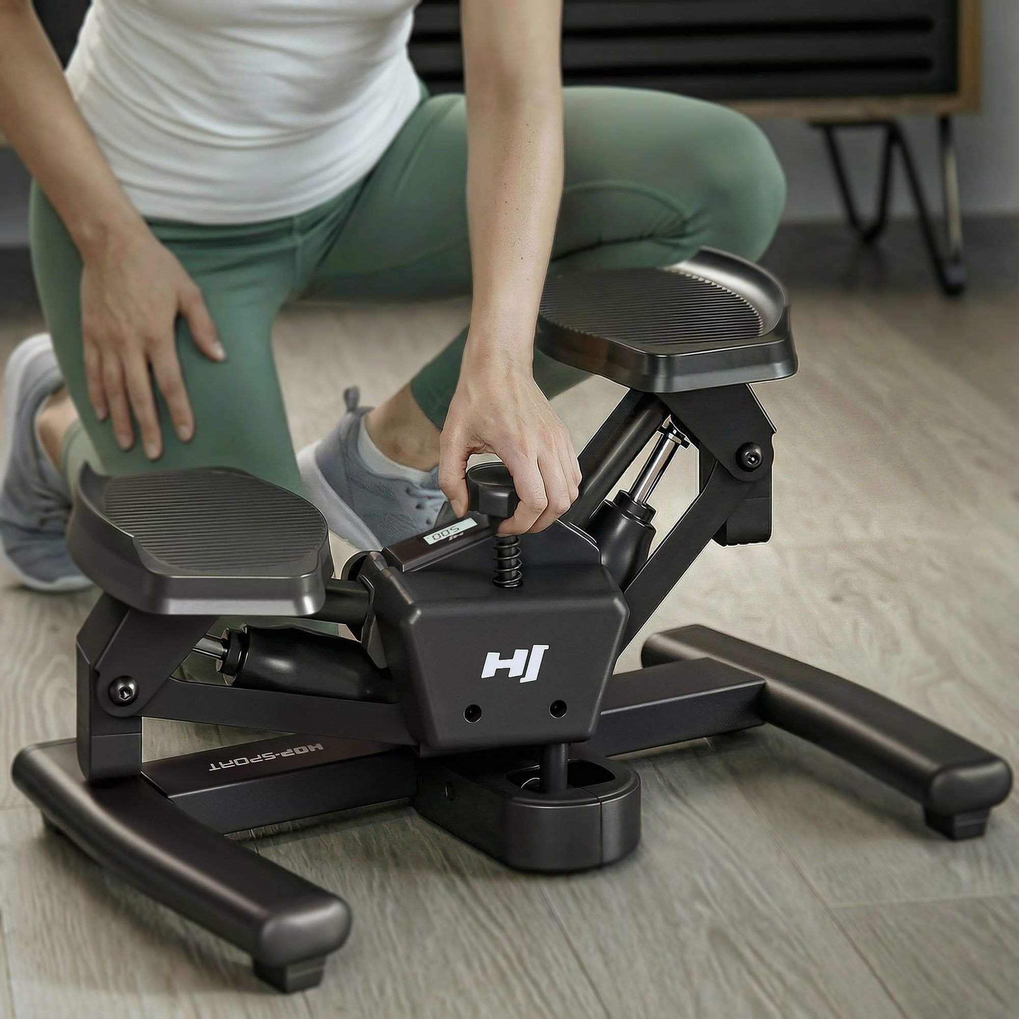 Écran LCD du stepper Snash affichant le nombre de pas, le temps et les calories.