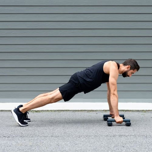 Pompes avec haltères