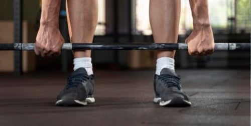 Rowing barre ou haltères - comment choisir l’équipement adapté à vos besoins ?