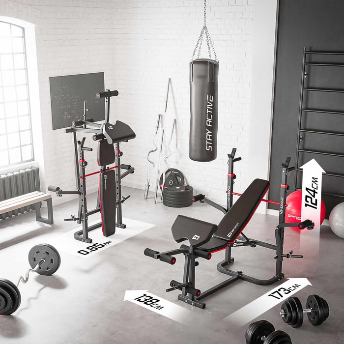 Banc de musculation complet avec modules papillon et flexion jambes.