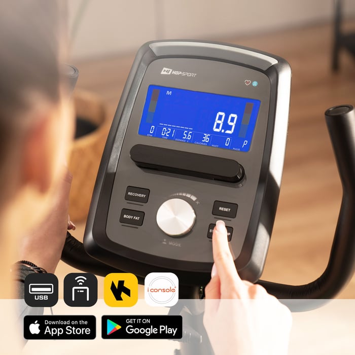 Écran LCD du vélo semi-allongé affichant tours par minute, temps, distance, calories et fréquence cardiaque